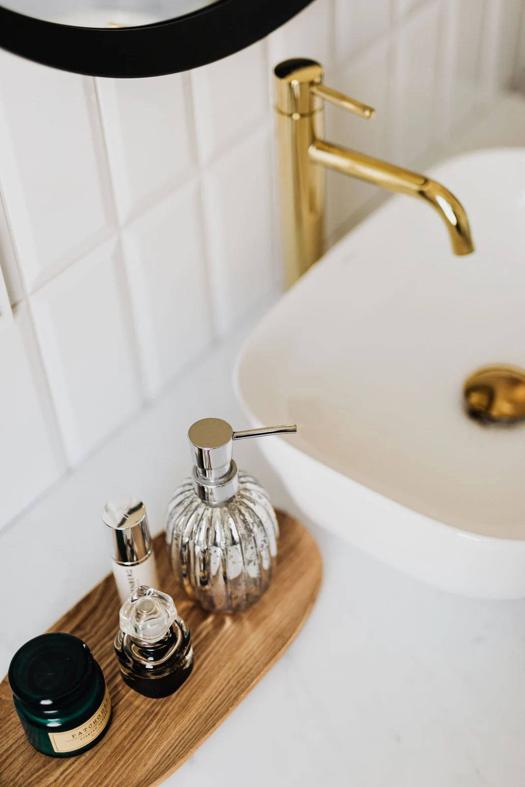 Bathroom basin and wooden toiletries tray